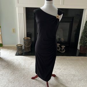 Special occasion or night out on the town black dress. Size medium size medium.